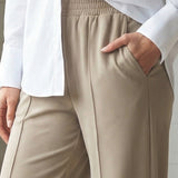 Pantaloni donna beige elasticizzati a gamba larga con interno in micropile - SABBIA - LG17